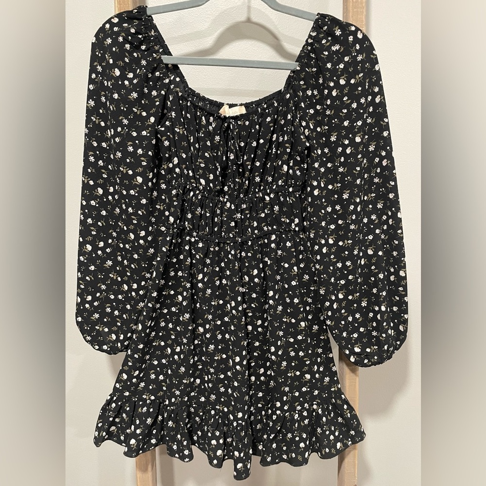 Perfect condition, Black mini dress with small cream flowers.